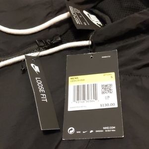 Nike Jackets & Coats - NWT Nike Black Swoosh Woven Anorak (Small-Medium) Nike Jackets & Coats - NWT Nike Black Swoosh Woven Anorak (Small-Medium)